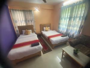 Thanapati Guesthouse客房内的一张或多张床位