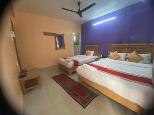 Thanapati Guesthouse客房内的一张或多张床位