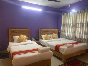 Thanapati Guesthouse客房内的一张或多张床位