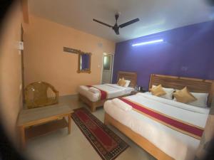 Thanapati Guesthouse客房内的一张或多张床位