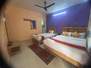 Thanapati Guesthouse客房内的一张或多张床位