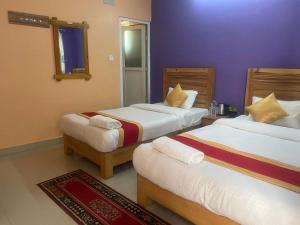 Thanapati Guesthouse客房内的一张或多张床位