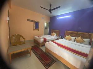 Thanapati Guesthouse客房内的一张或多张床位