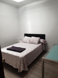 Postel nebo postele na pokoji v ubytování BELLADURMIENTE