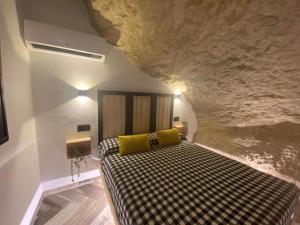 Posteľ alebo postele v izbe v ubytovaní Casa Rural Bajo la Alcazaba