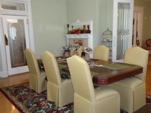 a dining room with a table and chairs at Sandstone Street Bed and Breakfast in Llano