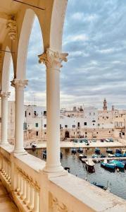 a view of a harbor with boats in the water at Casa Carlotta in Monopoli