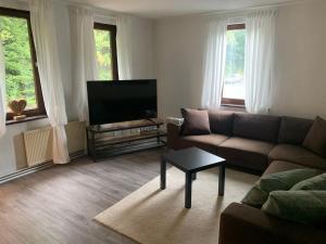 Ruang duduk di Ferienwohnung an der Oker