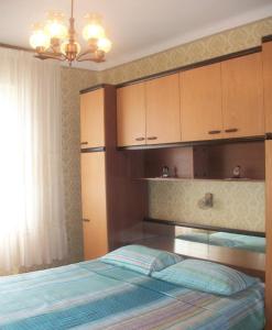 Tempat tidur dalam kamar di Apartment Banjol 137