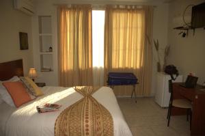 Postel nebo postele na pokoji v ubytování Hotel Air Suites