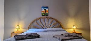 A bed or beds in a room at Giardino San Nicola