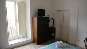 Giường trong phòng chung tại Casa Vacanza Anacapri Sunrise