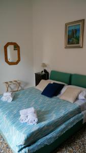 Giường trong phòng chung tại Casa Vacanza Anacapri Sunrise