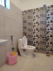 Et badeværelse på Fasil-Town Rooms Near Isb Air port