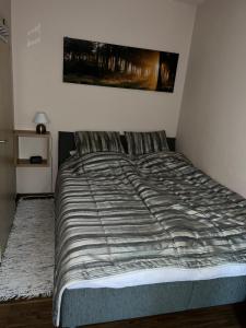 Ένα ή περισσότερα κρεβάτια σε δωμάτιο στο Apartmán Kykula - Terchová, Vyšné Kamence 1520