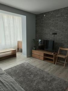 Μια τηλεόραση ή/και κέντρο ψυχαγωγίας στο NEW apartment for RELAX