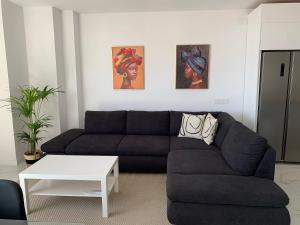 Posedenie v ubytovaní Apartamento Casa Blanca