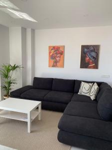 Posedenie v ubytovaní Apartamento Casa Blanca