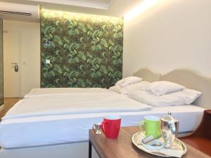 Postel nebo postele na pokoji v ubytování Hotel Kraft