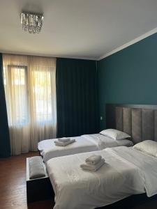 Voodi või voodid majutusasutuse Monte Bianco toas