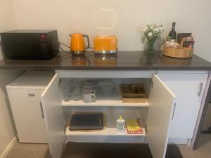 Eldhús eða eldhúskrókur á Huntlee Getaway