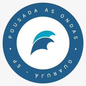 a blue circular logo with a dolphin in the center at Pousada As Ondas in Guarujá