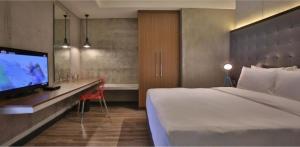 Letto o letti in una camera di The B Hotel Quezon City