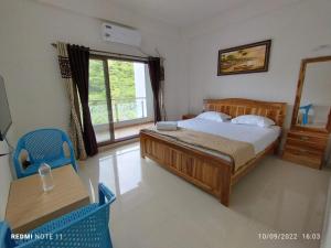 Hotel Kavijay Sea View客房内的一张或多张床位