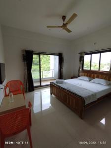 Hotel Kavijay Sea View客房内的一张或多张床位