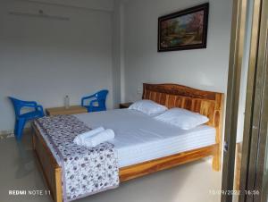 Hotel Kavijay Sea View客房内的一张或多张床位