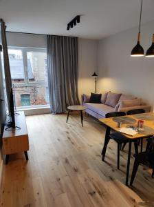 Uma área de estar em Bohema Praga Apartments, Metro Szwedzka, near Old Town