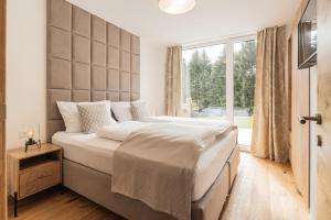 Postel nebo postele na pokoji v ubytování Granit Appartements