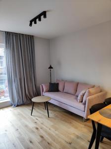 Uma área de estar em Bohema Praga Apartments, Metro Szwedzka, near Old Town