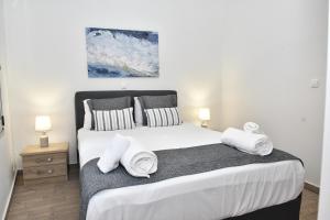 Кровать или кровати в номере Michaela's guesthouse
