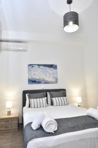 Кровать или кровати в номере Michaela's guesthouse