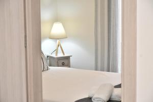 Кровать или кровати в номере Michaela's guesthouse