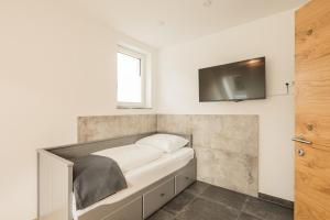 Telewizja i/lub zestaw kina domowego w obiekcie Granit Appartements
