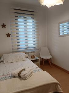 Cama o camas de una habitación en A los Ojos del Río Duero