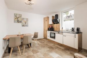 Kuchnia lub aneks kuchenny w obiekcie Granit Appartements