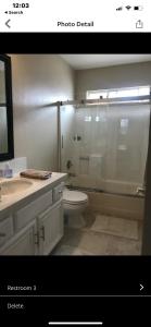 A bathroom at Pacific Breeze Right Next to Huntington Beach Pier! Steps from Beach!!