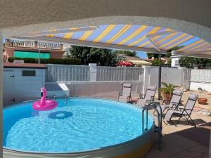 The swimming pool at or close to Torredembarra cosy, well equipped house, 5 min. from the beach