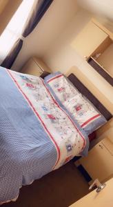 a bed in a small room with drawers at G10 Hoburne Devon Bay pet friendly in Goodrington