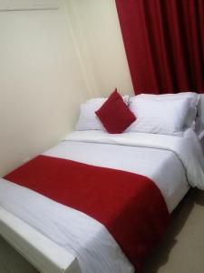 Un pat sau paturi într-o cameră la Nanyuki Mostays