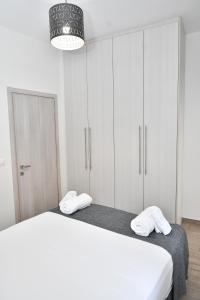 Кровать или кровати в номере Michaela's guesthouse