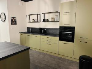 Kuchyňa alebo kuchynka v ubytovaní Loft atypique Dunkerque Centre