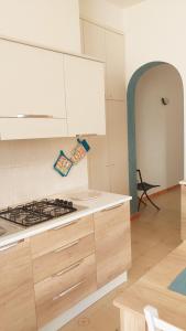 Kuchyň nebo kuchyňský kout v ubytování Verdemare + 33 fotografií