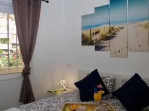 A bed or beds in a room at Florida Ocean View Gigantes