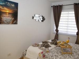 A bed or beds in a room at Florida Ocean View Gigantes