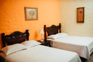 Voodi või voodid majutusasutuse Hotel Condesa toas