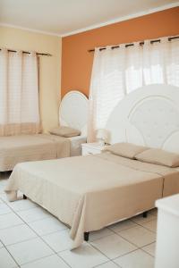 Voodi või voodid majutusasutuse Hotel Condesa toas